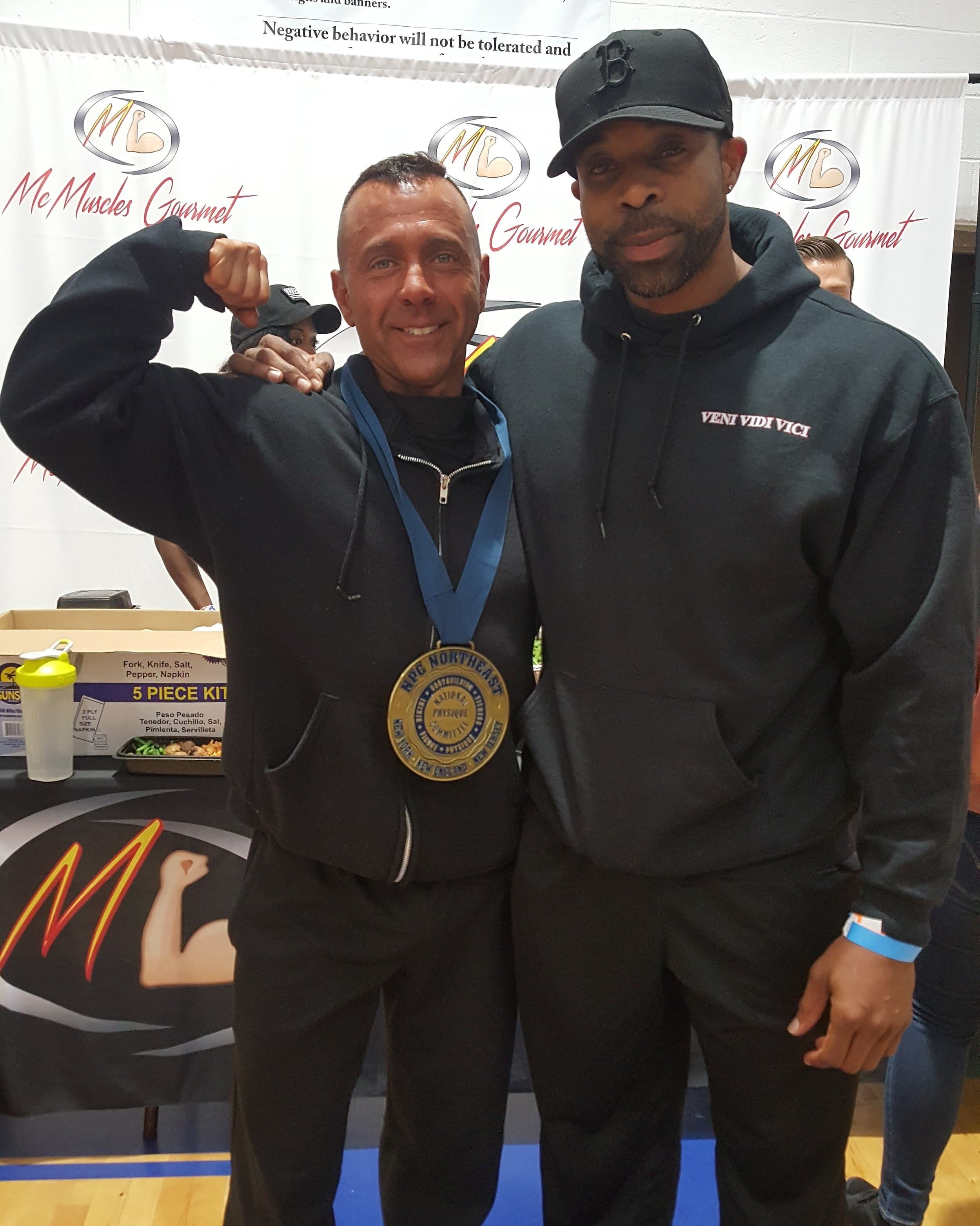 Daine Chang at a show with a client wearing his NPC medal