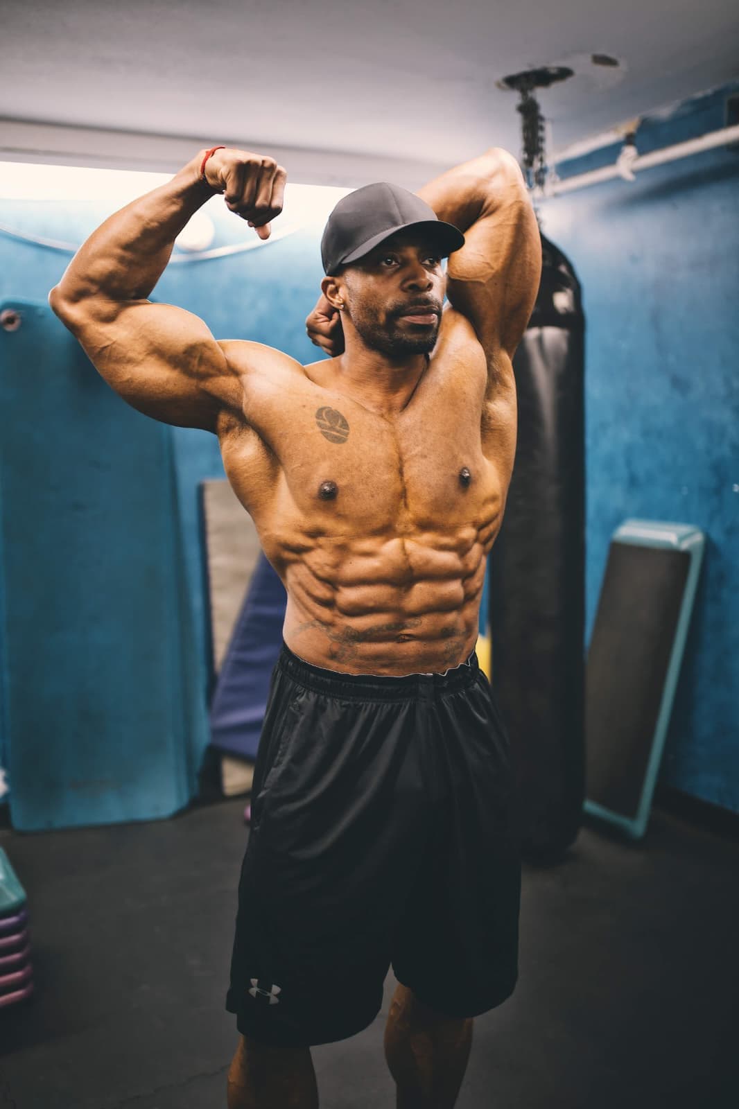 Daine Chang hitting a double biceps pose