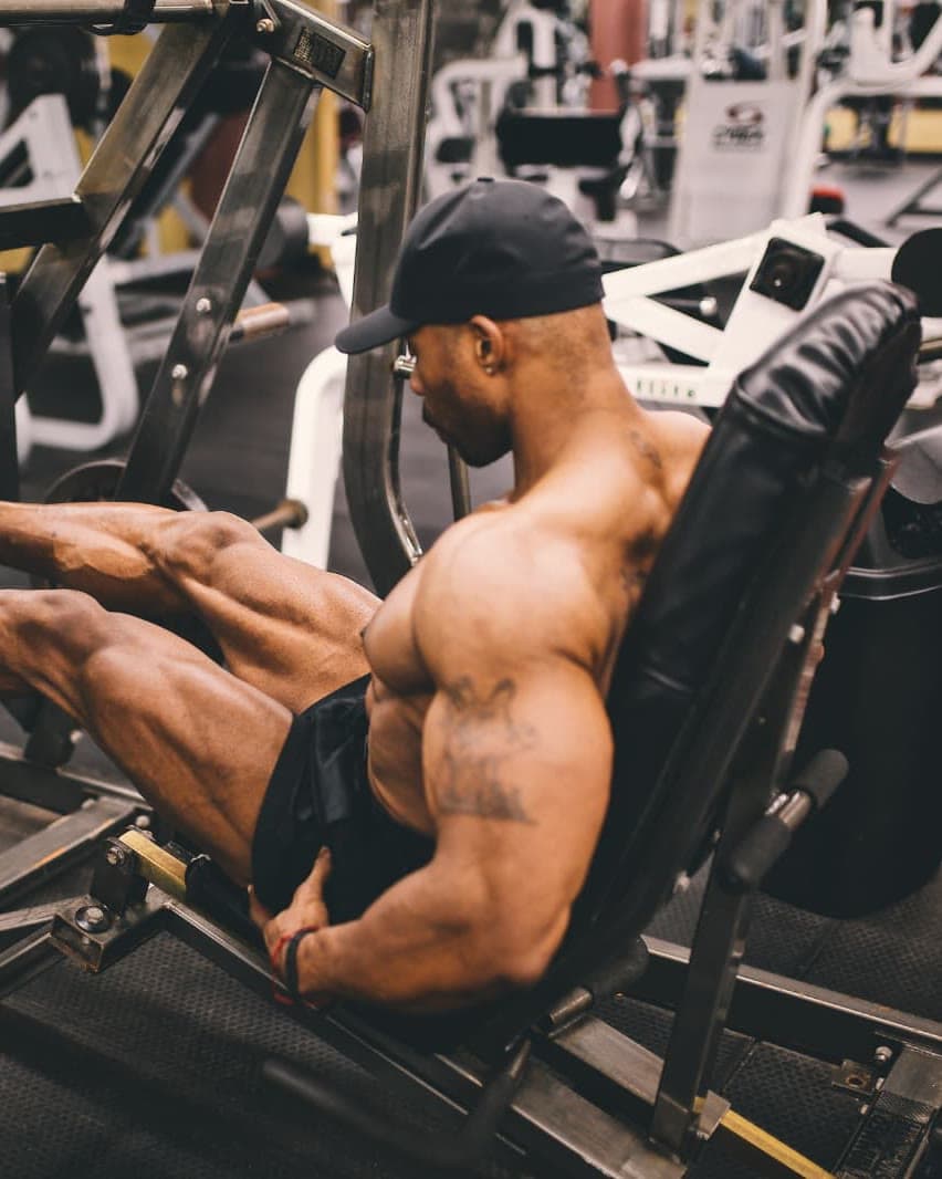 Daine Chang training alone on the leg press
